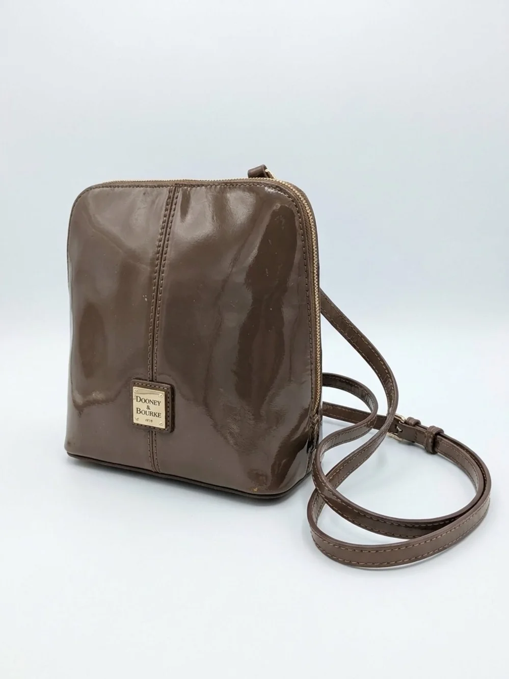 Dooney & Bourke Brown Patent Leather Crossbody Bag Gold Logo